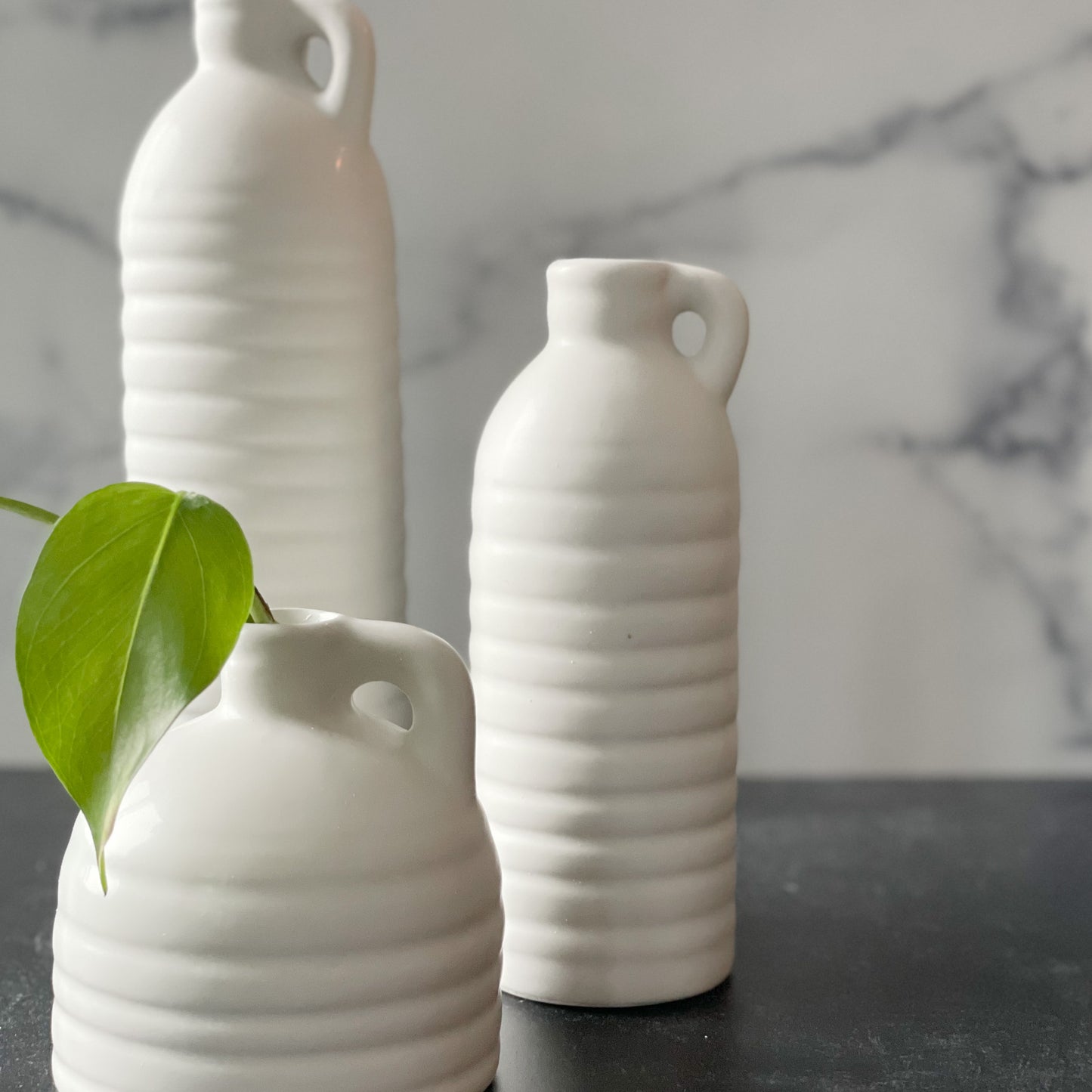 Set of three bud vases with handles